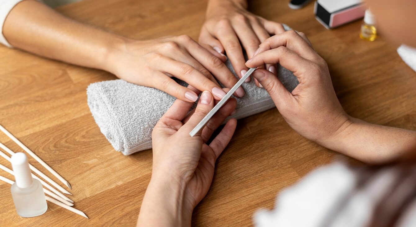 hands-holding-nail-file-close-up