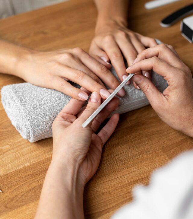 hands-holding-nail-file-close-up